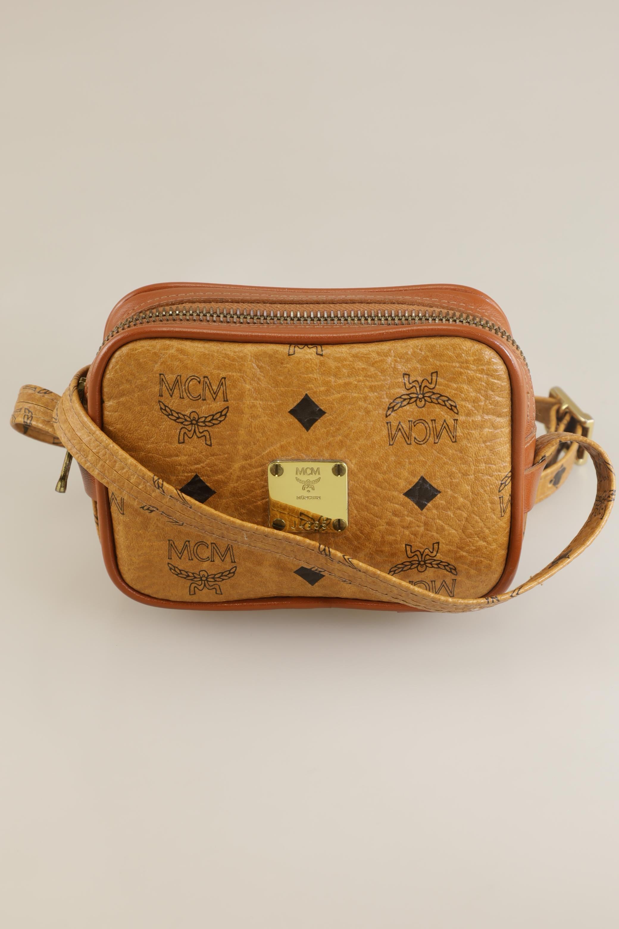 mcm-damen-handtasche-klein-braun-3387c601-471e-47d9-ac48-1d94bccfd964-image-0